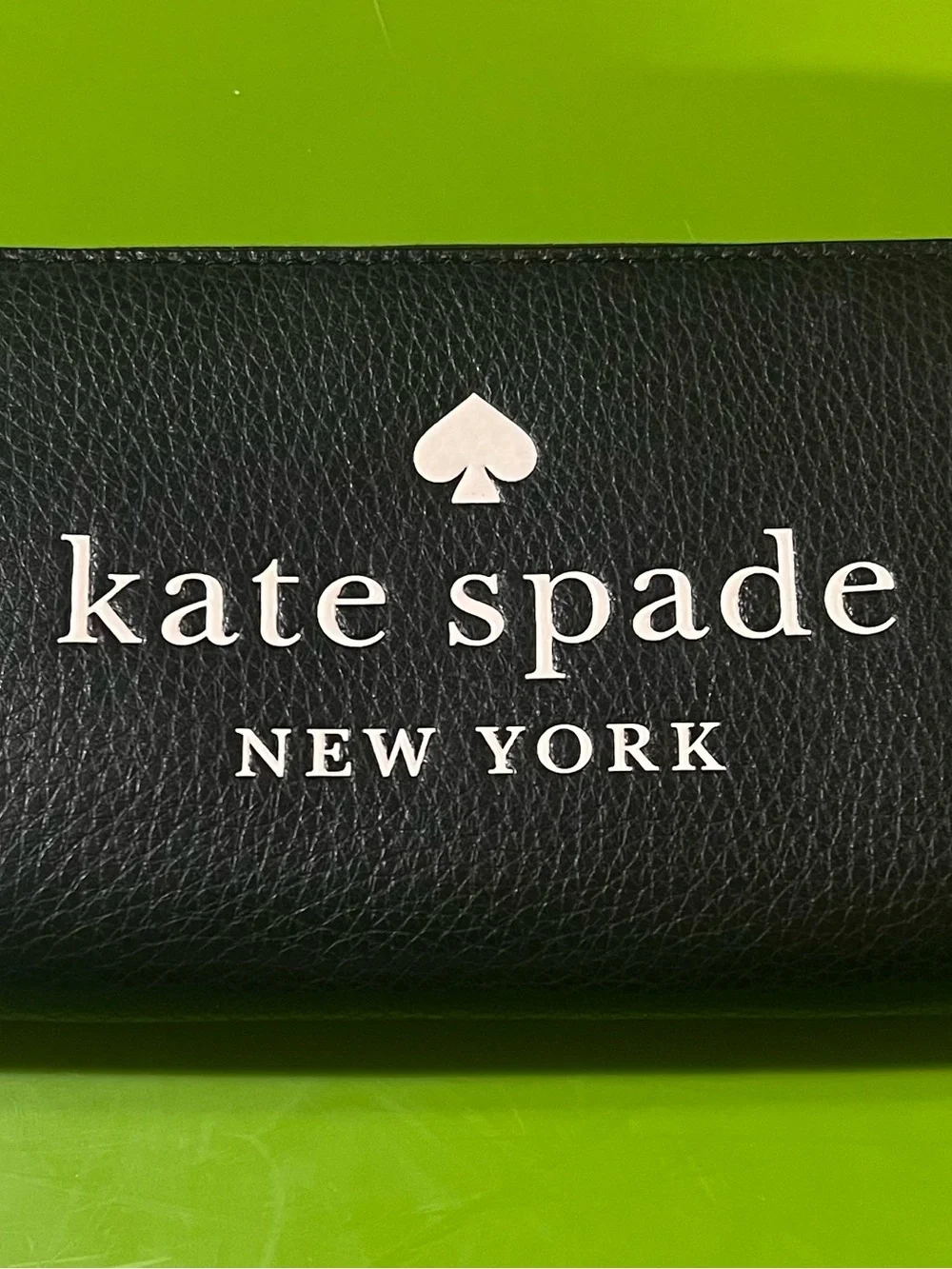 kate spade Black Pebbled Leather Wallet with White Logo